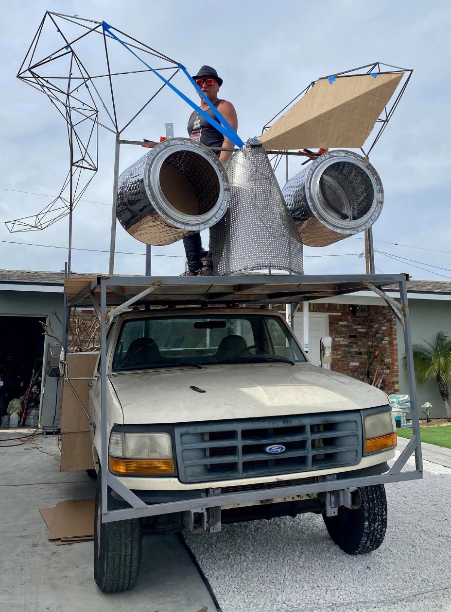 A photo of a truck with mask frame